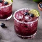 Blueberry margarita recipe with fresh berries and lime